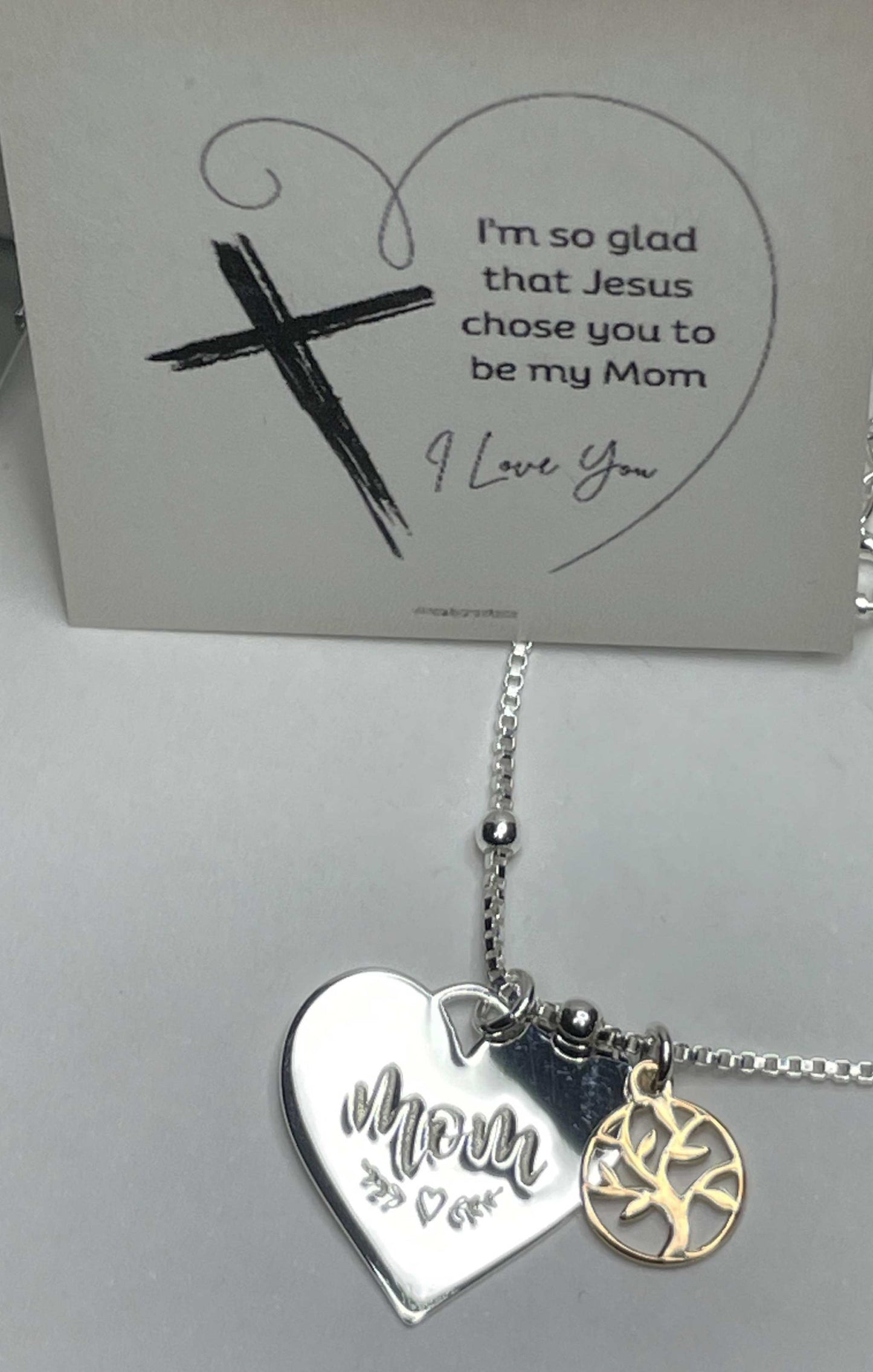 Mom and family tree necklace with sterling silver heart pendant and rose gold plated charm.