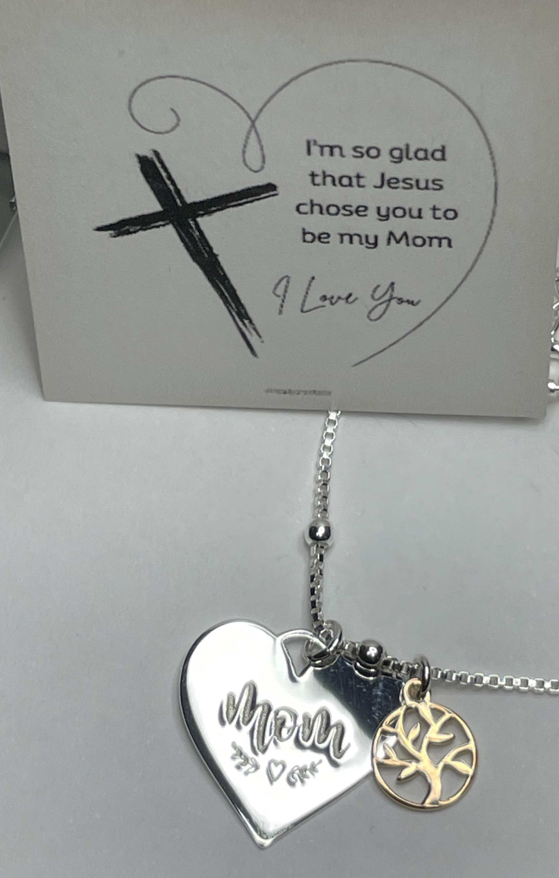 Mom and family tree necklace with sterling silver heart pendant and rose gold plated charm.