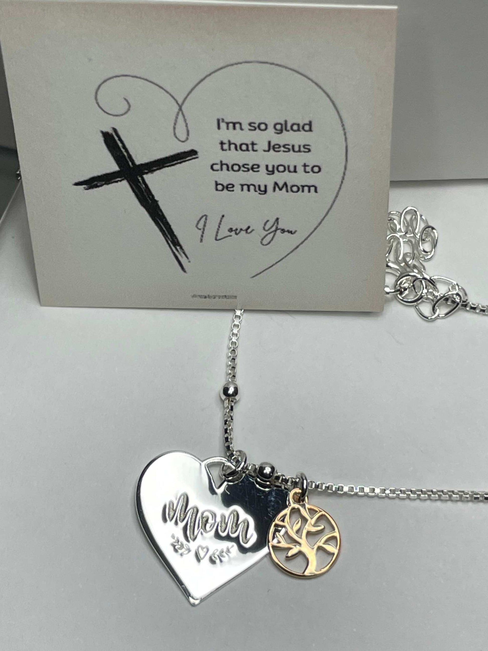 Sterling silver mom and family tree necklace with heart pendant and rose gold plated charm.